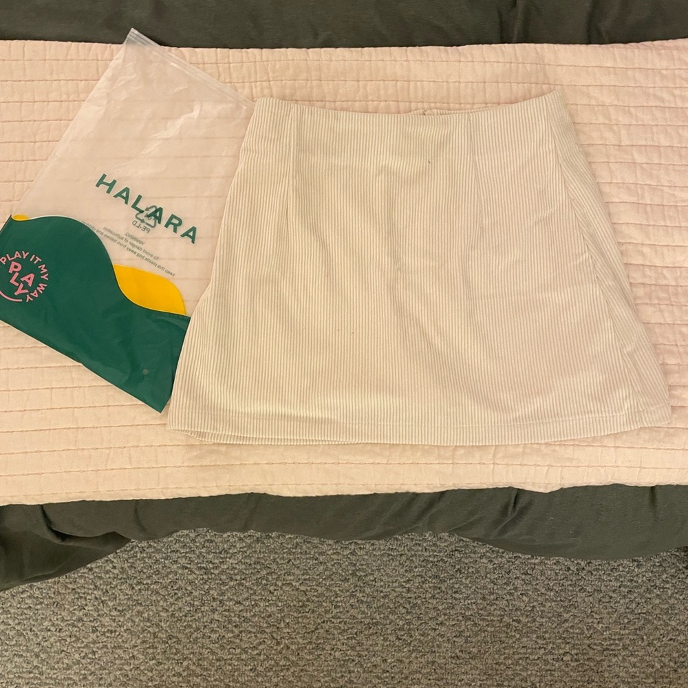 Halara Cream Corduroy mini skirt with built in short.